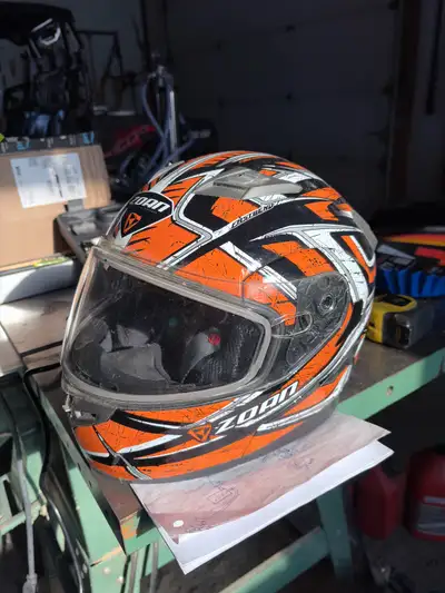 Zoan modular snowmobile helmet. Size small adult. Only used in 3 occasions. Has retractable yellow l...