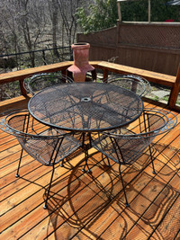 Iron round table and four chairs