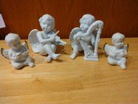 NEW FOUR WHITE SCULPTURED PORCELAIN ANGLES WITH WINGS
