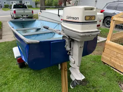 For sale is a used 14-foot boat, complete with a reliable motor and sturdy trailer, perfect for a we...