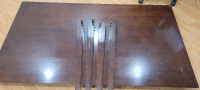 5x3  Used wood dinning room table with 4 chairs.