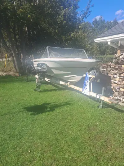 Hull is solid, but flooring must be removed and replaced due to many winters stored outside. 50 hp U...