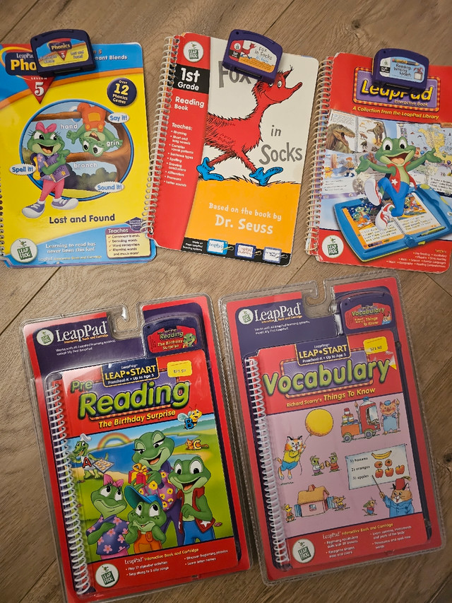 Sppu 5 LeapPad Books and Cartridges  (2 brand new) in Toys & Games in Saskatoon