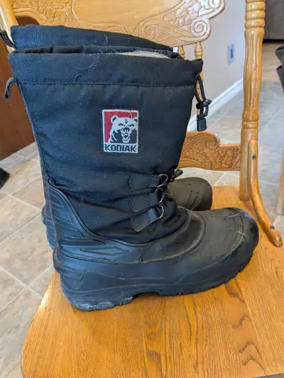 Grab these Kodiak winter snowmobile boots, size 12, to keep your feet warm! These boots are perfect...
