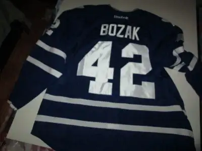 This blue Toronto Maple Leafs jersey was worn by Assistant Captain Tyler Bozak during the 2015-2016...