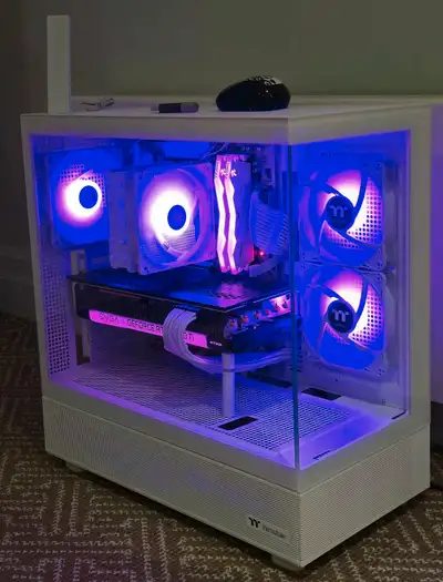 I'm selling a custom-built gaming PC in excellent condition. It features high-performance components...