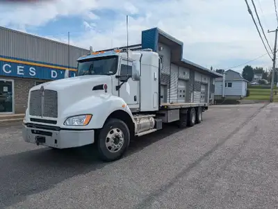 Kenworth rollback truck for sale. The truck is saftied and emission done. Truck is in very good cond...