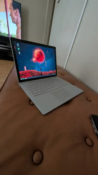 Microsoft Surface book 2 laptop Core i5, 8gb ram, 256gb ssd Currently running Linux mint, happy to p...