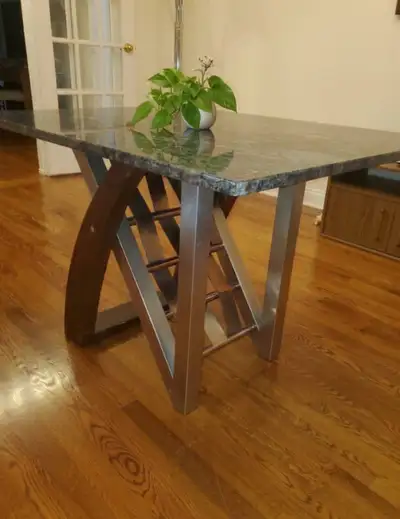 Beautiful modern table with solid stone top and sturdy base In good used condition Dimensions: Lengt...