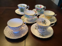 Four different Bone China teacups and saucers