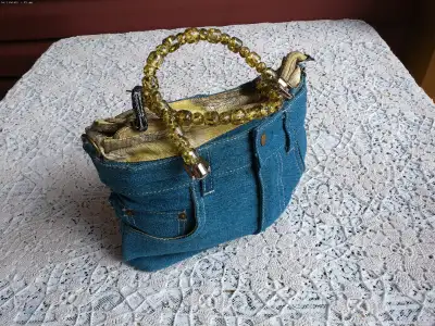 BAGGY JEANS PURSE WITH BEADED STYLE HANDLE APPROX. 11"L X 12"H $20 AD VISIBLE THEN ITEM AVAILABLE