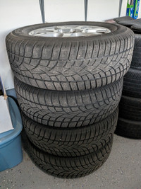 Set of 4 winter tires on Alloy rims. Size 235/66R17