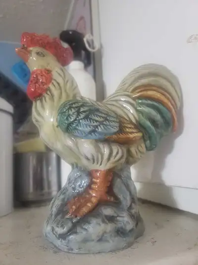 Add a touch of rustic charm to your home decor with this used ceramic rooster figurine, standing pro...