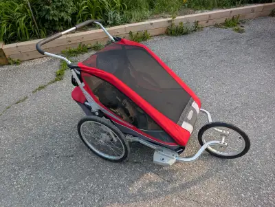 Looking for a reliable stroller for your next adventure with two little ones? This double jogging st...