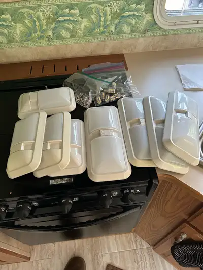 I am selling a set of used RV trailer lights, perfect for upgrading or replacing the interior lighti...