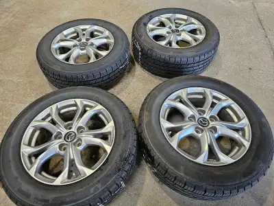 Brand new bridgestone turanza everdrive all season tires with mazda rims 215/60r16 Meet-up or can de...