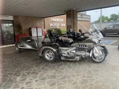 Selling for my parents, as my dad can no longer ride, immaculate trike and trailer great for long ro...