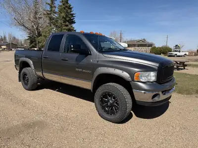 2005 Dodge Ram 3500 SLT Quad cab short box with the 5.9L HO Cummins Turbo Diesel. Second owner, neve...