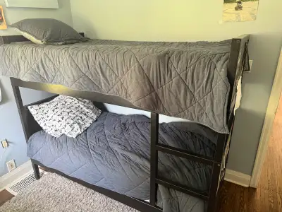 5 years old. Black idea bunk bed. Lightly used. Must take apart to get out of house. Two person job...