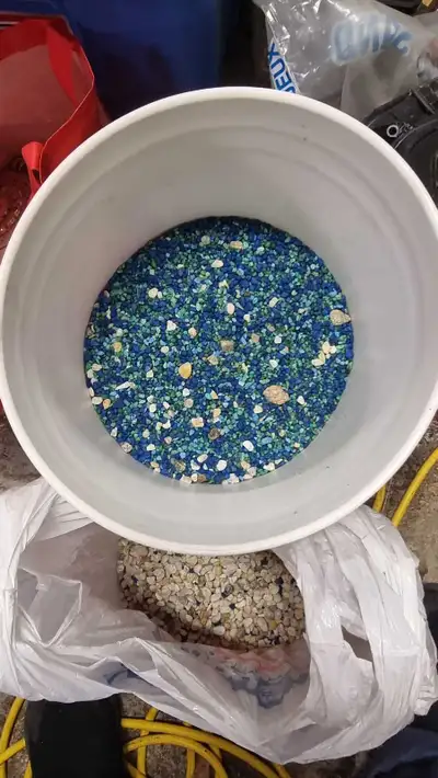 Selling my aquarium gravel. I have half of a 5 gallon bucket, filled with colorful gravel & a bags w...