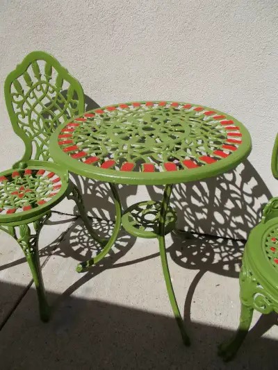 Cast iron patio table and two chairs high quality no cracking , no deformation , no rust . beautiful...