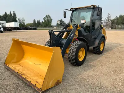 Features: o Enclosed Cab o Sound System o Heat o Air Conditioning o Auxiliary Hydraulics o Block Hea...