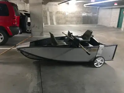 8'6" Portabote. Comes with transport wheels ($300 US value), padded seats, two piece oars, rod holde...
