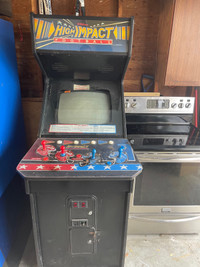 Vintage Konami Arcade Cabinet with High Impact Football