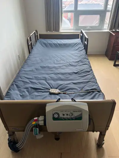 INVACARE HOSPITAL BED WITH AIR MATTRESS, View more