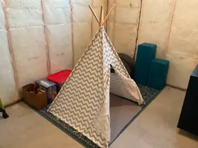 Durable canvas material. Folds up easily for storage or ease of transport ( we used a bungee cord to...