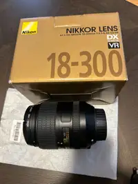Like new Nikon Lens 18-300 Retail $1000
