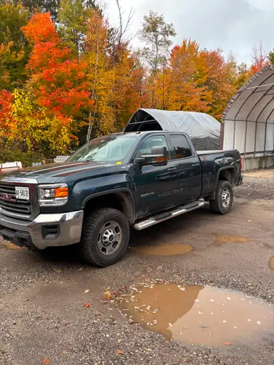 2500HD double cab pickup with low kms Good shape overall plow can be sold with it separately if inte...