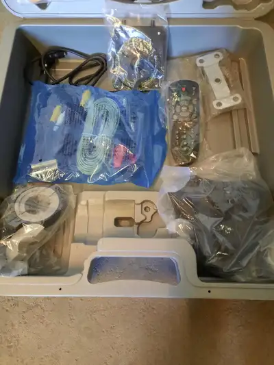 Satellite dish 15" with receiver, remote, support arm, mounting bracket and all cords included...ins...