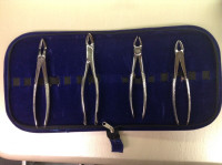 4 Dental Extractors in a carrying case