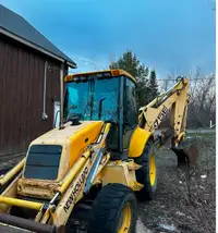 NEW HOLLAND 575E Tractopelle