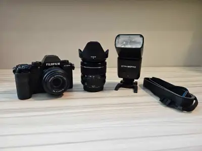 Fujifilm X-S10 with XF 18-55mm lens, XC 35mm lens, rechargable Godox V350 flash (rebranded by strobe...