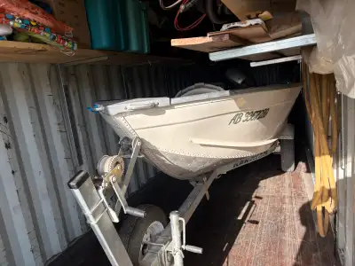 For sale 2008 14 foot 67” wide Lowe boat with a Honda 20 hp four stroke good condition comes with a...