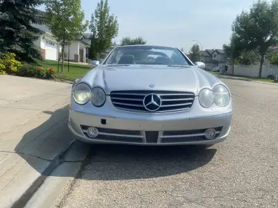 Hard top convertible, 2 owners, extensive maintenance completed including roof lock cylinder, hydrau...