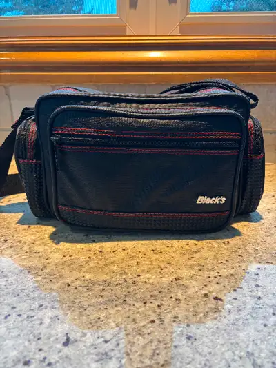 Main compartment is 10.25 inches x 7 inches tall x 5 inches. Has 2 zippered side pockets, dividers i...