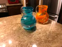 2 handblown glass pitchers