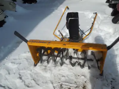 Cub Cadet Snow Blower for Lawn Tractor in very good condition, 42 inches wide, tire chains and wheel...