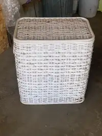White wicker large laundry basket and natural magazine rack 