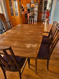 Large dining room table with 8 chairs