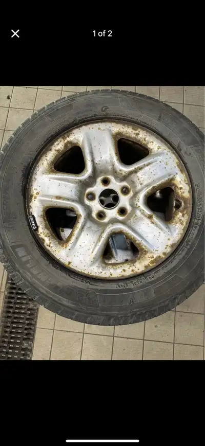 Selling a set of All-Season tires on rims from a RAV4. Bolt pattern is 5x114.3mm. Two Firestone, two...