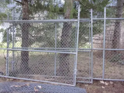 large chain-link gates barbwire top / three lower, View more