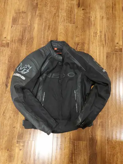 XS Nexo Motorcycle Jacket with proper padding,good condition,asking $125 OBO,plz call 416-627-3735,t...