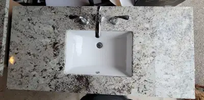 48" (INCH) VANITY WITH GRANITE COUNTERTOP AND CHROME FAUCET Measurements 48x32.5x22.5 inches Two of...