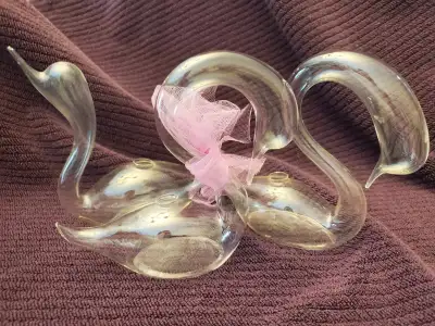 Glass flower holders, View more