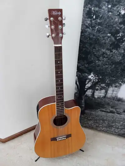 MINT CONDITION 6 STRING MELODY ACOUSTIC GUITAR! ONLY $200, View more
