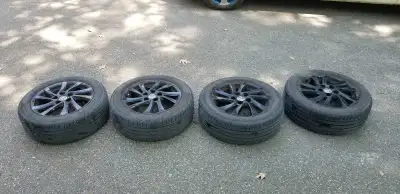 Four black OEM Mazda rims in good condition. Not perfect but still look very nice. Tires are Pirelli...